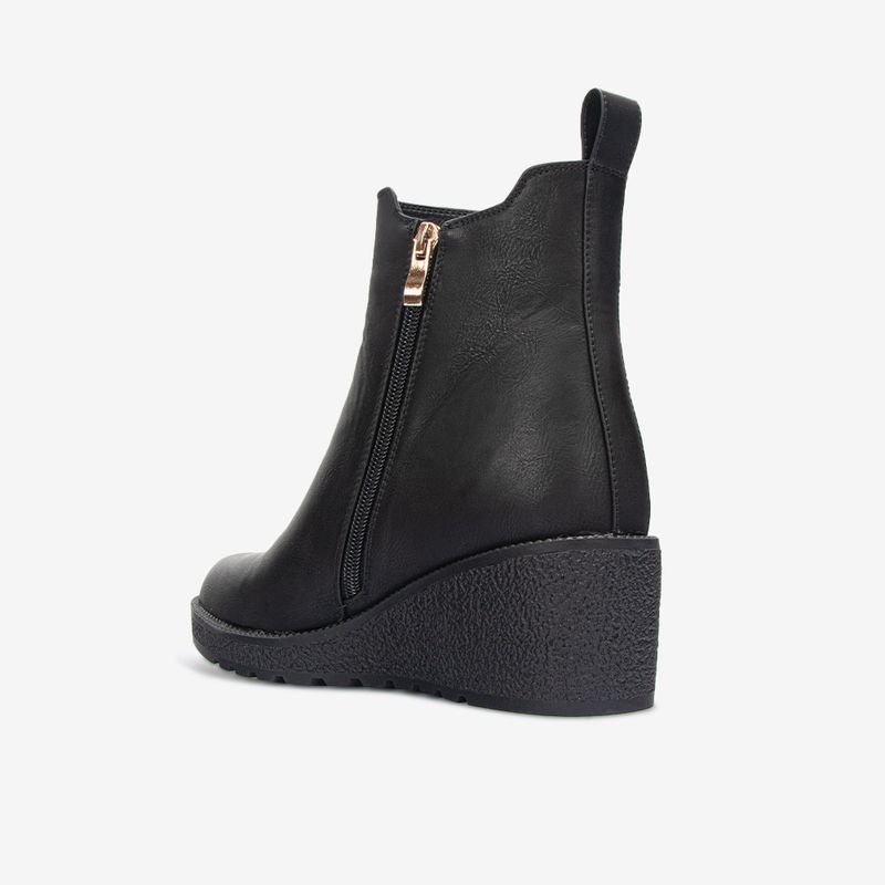 Botin-casual-de-pu-con-taco-cuna-color-negro