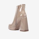 Botin-casual-acharolado-con-taco-alto-color-beige