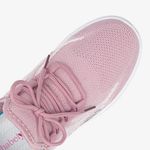 Zapatilla-textil-con-planta-flexible-color-rosado-blanco